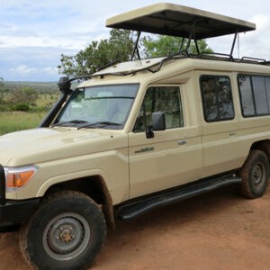 safari-land-cruiser with a driver guide
